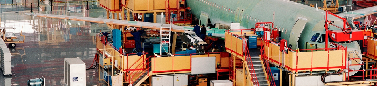 Airplanes being worked on in a hangar