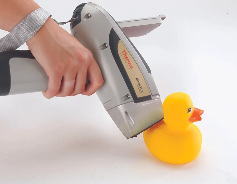 Thermo Scientific Niton XL3t handheld XRF analyzer used to scan rubber ducky
