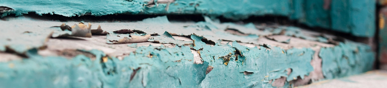 Chipped paint on a window sill